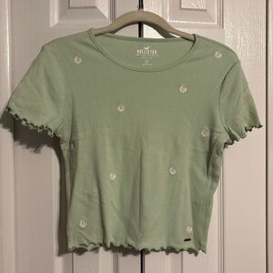 Hollister short sleeve baby tee in green with flowers size small  NWOT